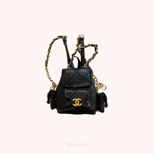 Mini Black Quilted Backpack with Gold Chain – Collector’s Essential ToyUnity